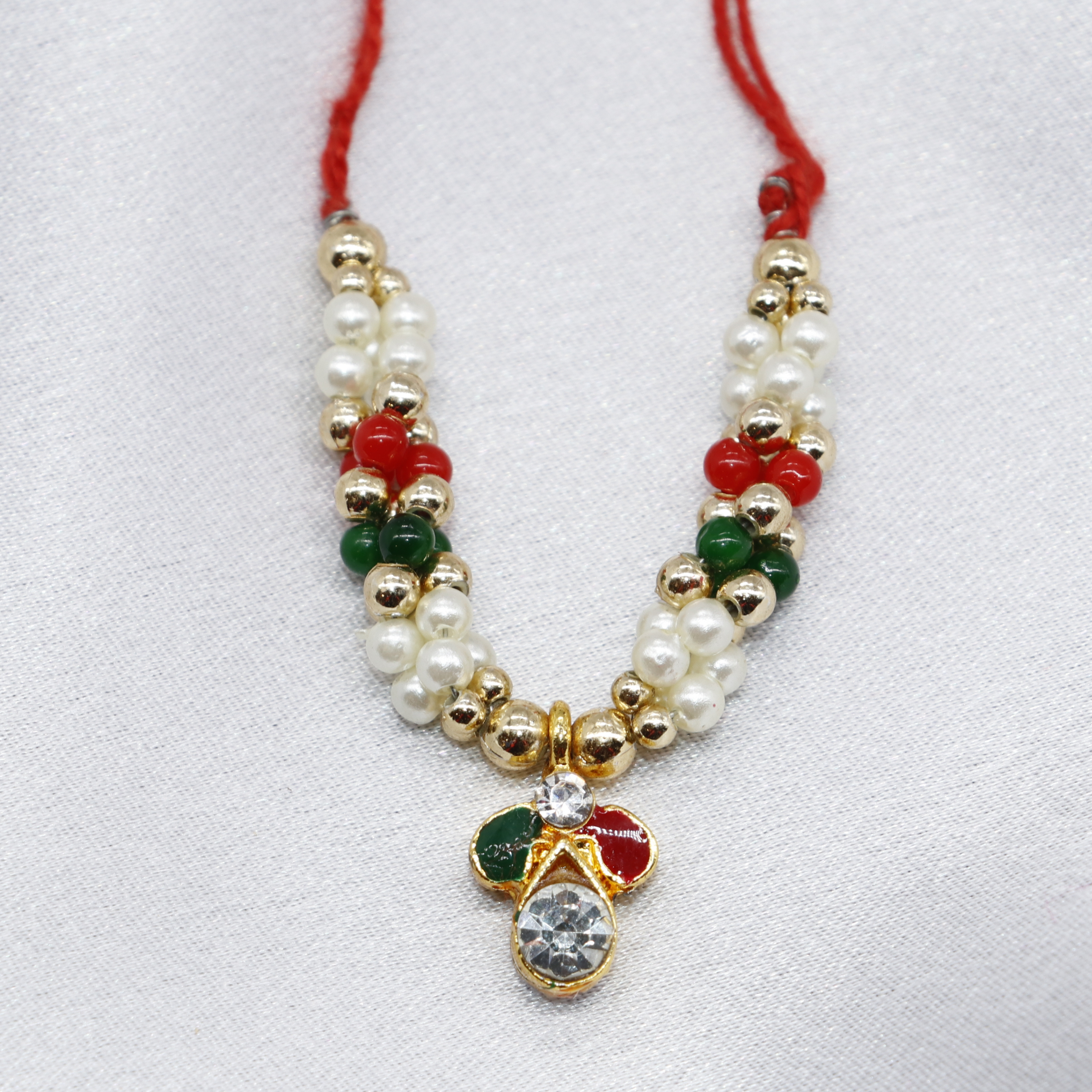 લડુ ગોપાલ પેક ઓફ - 12 માટે ત્રિરંગા મોતી માલા